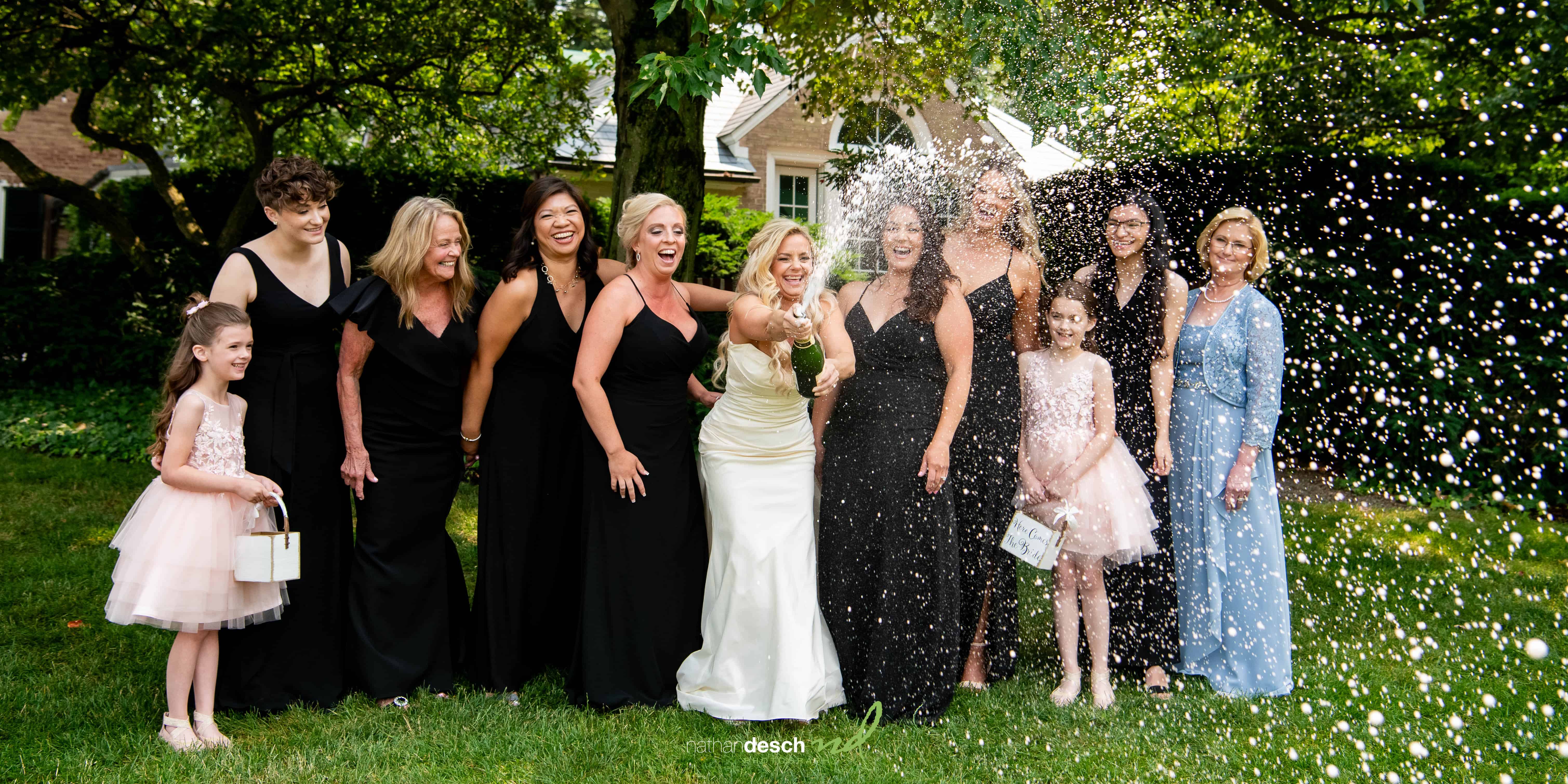 bridal party with champagne 