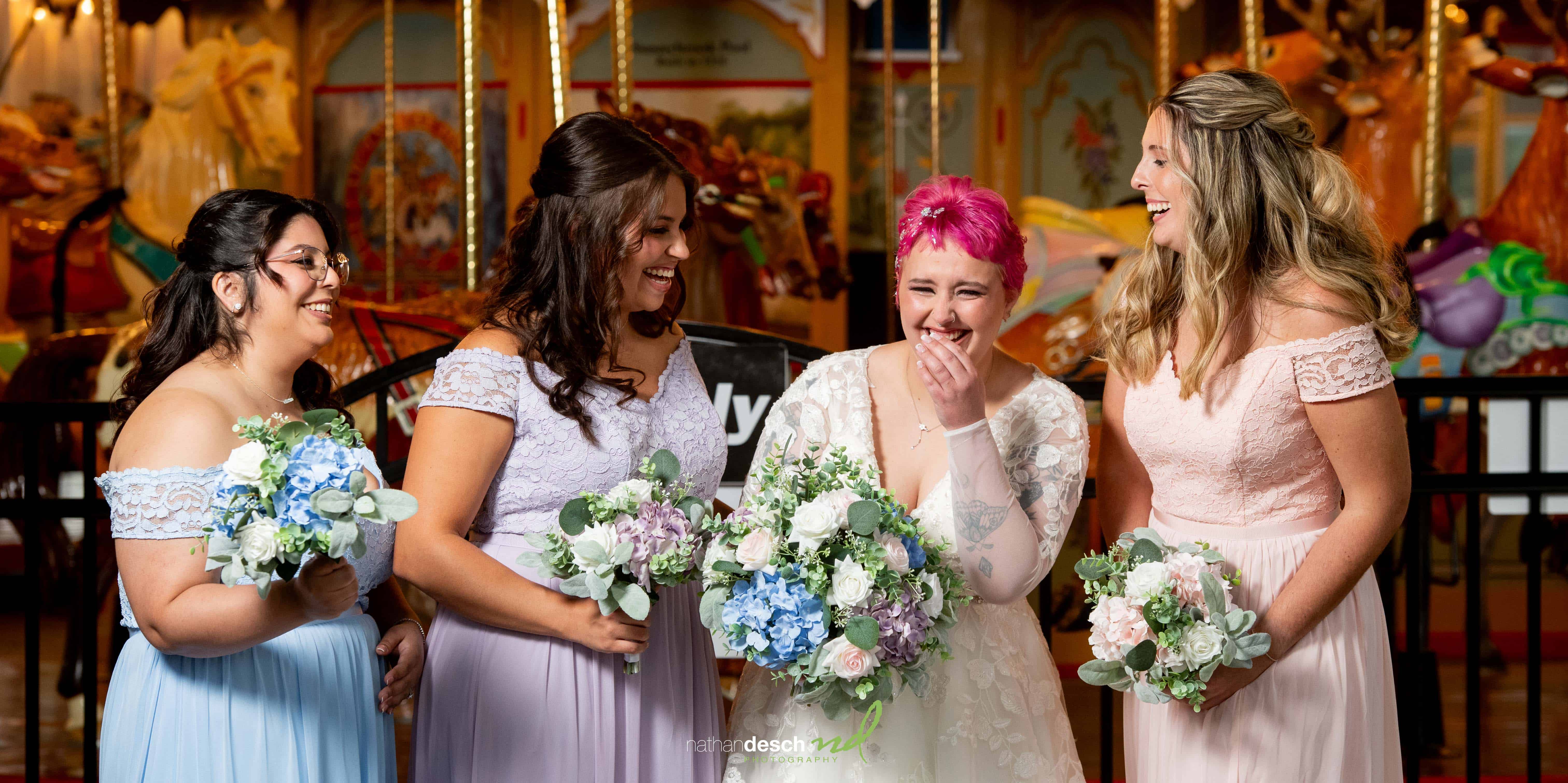 bride and bridesmaids laughing