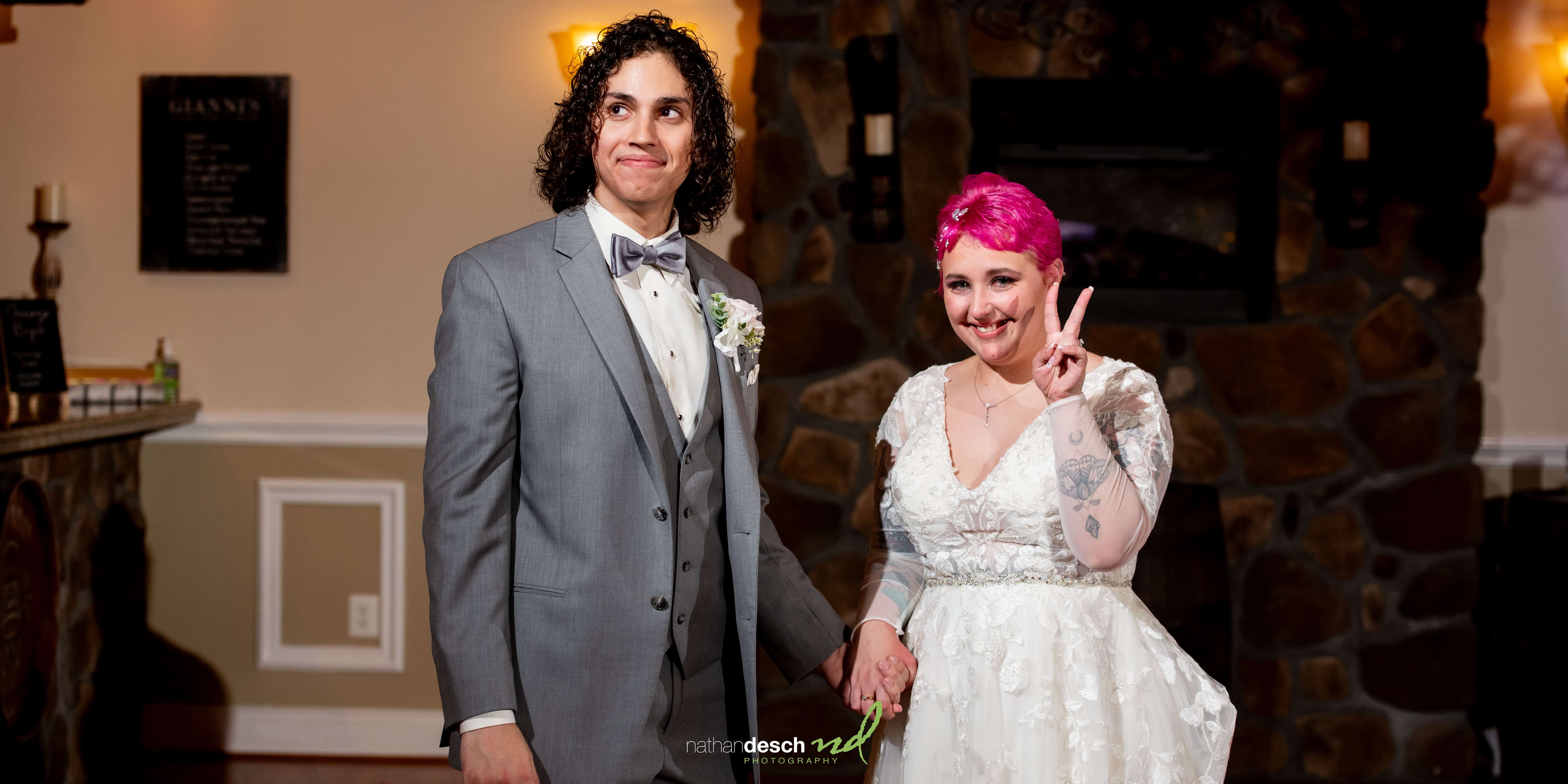 quirky bride and groom having fun at wedding