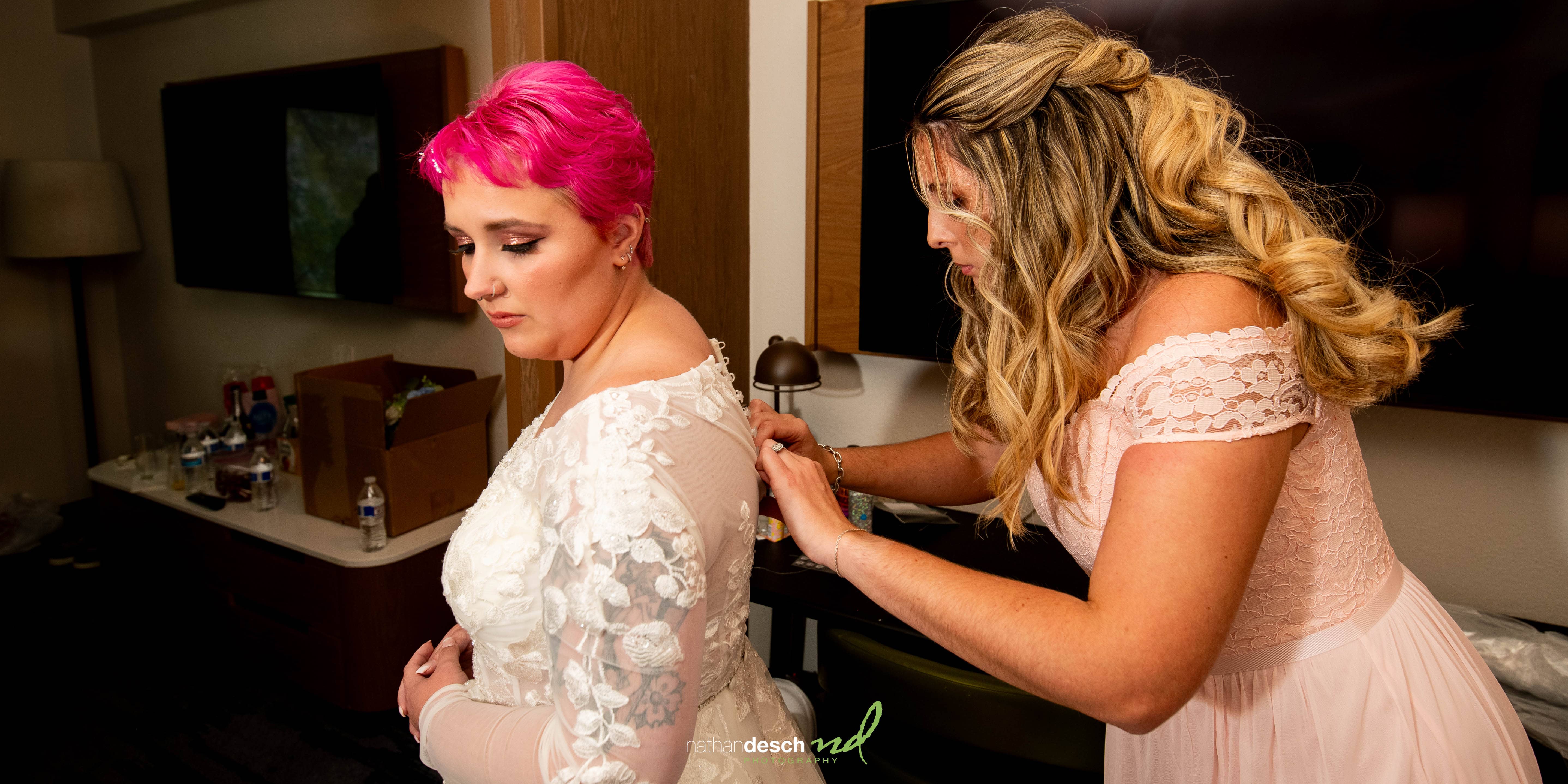 bride with pink hair getting ready