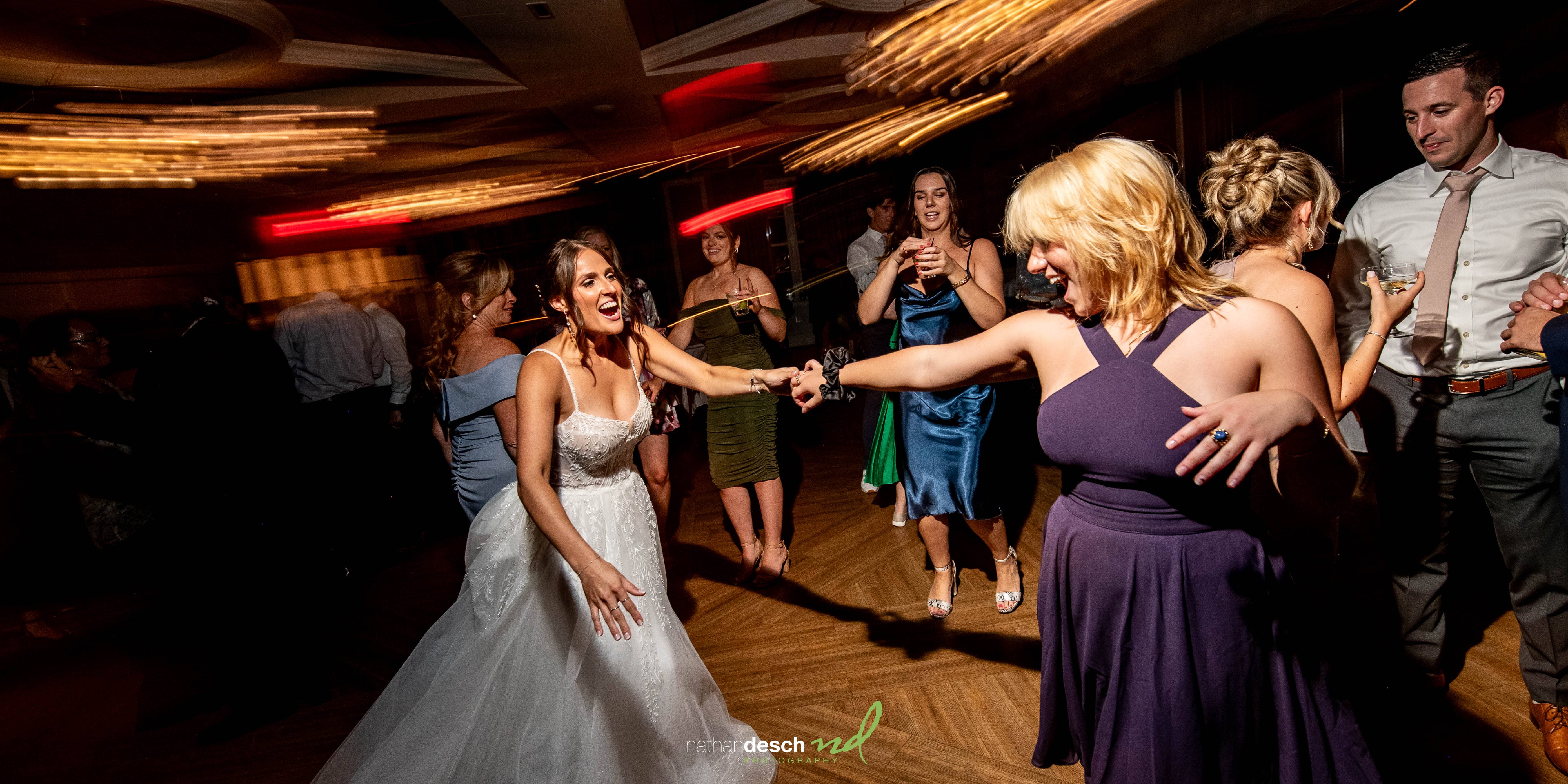 Bride on dance floor with motion blur