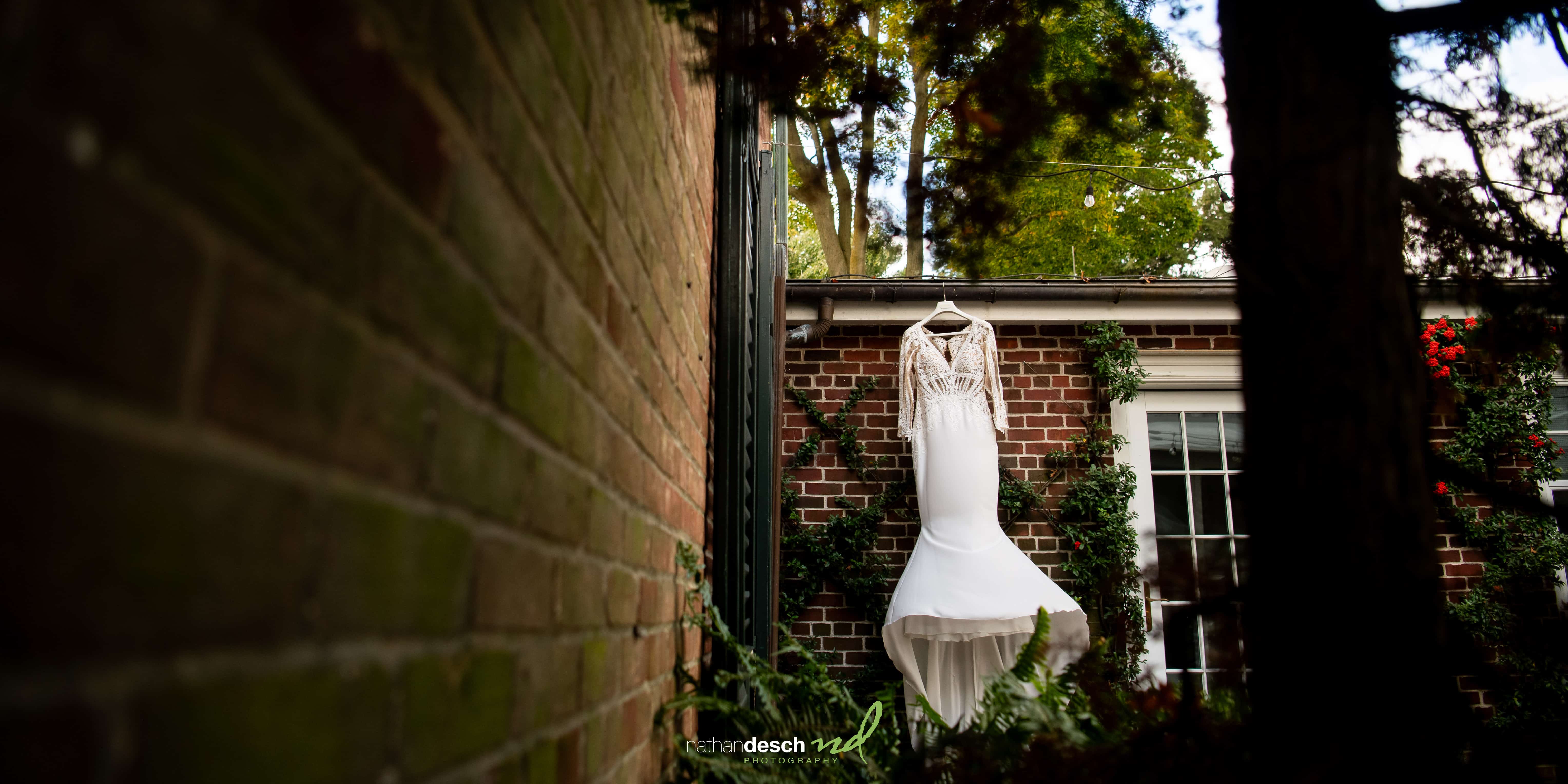 wedding dress hanging outside