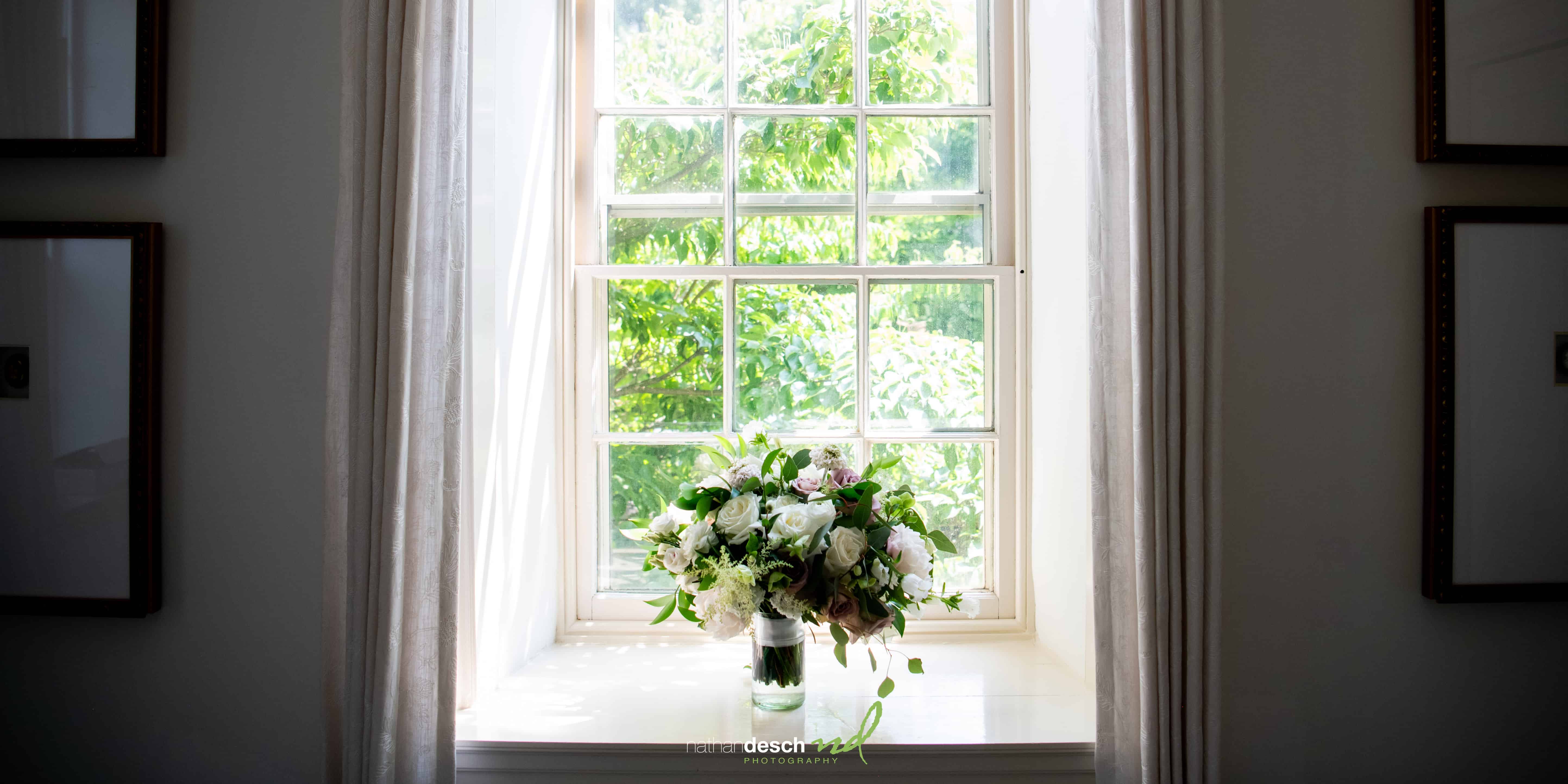 Bouquet of flowers by window