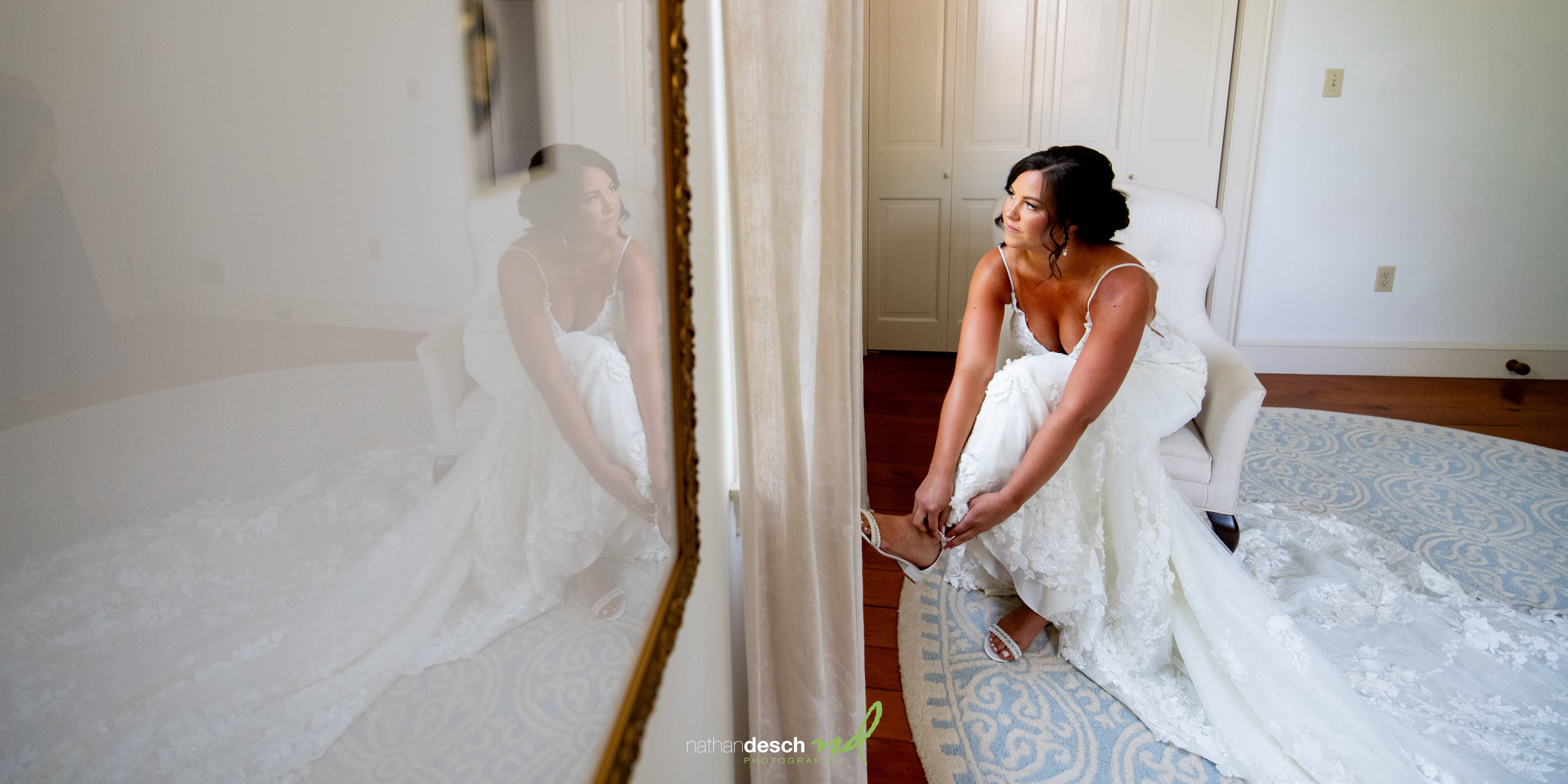 Bride getting shoes on