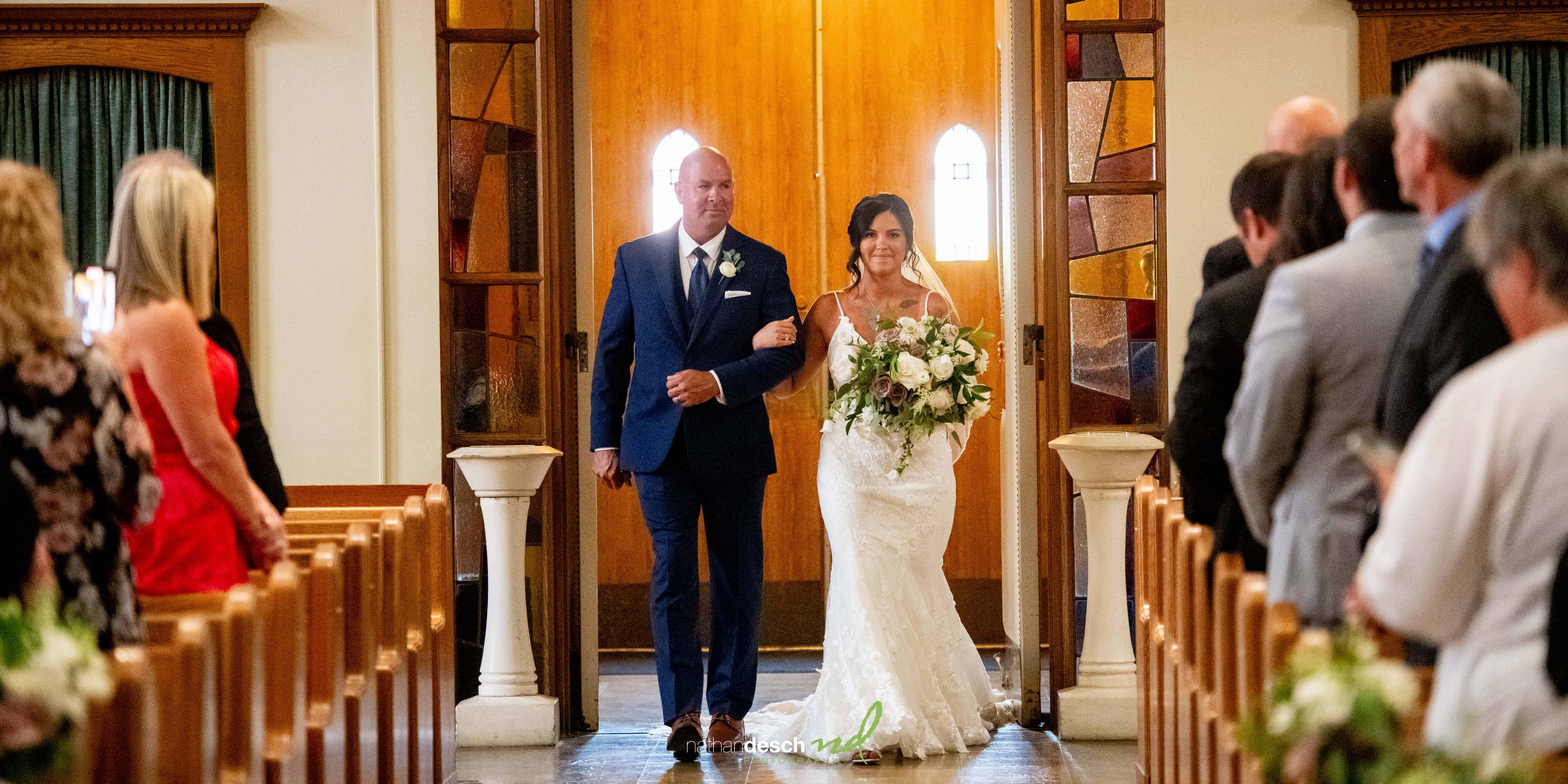 Bride and father coming down the aisle