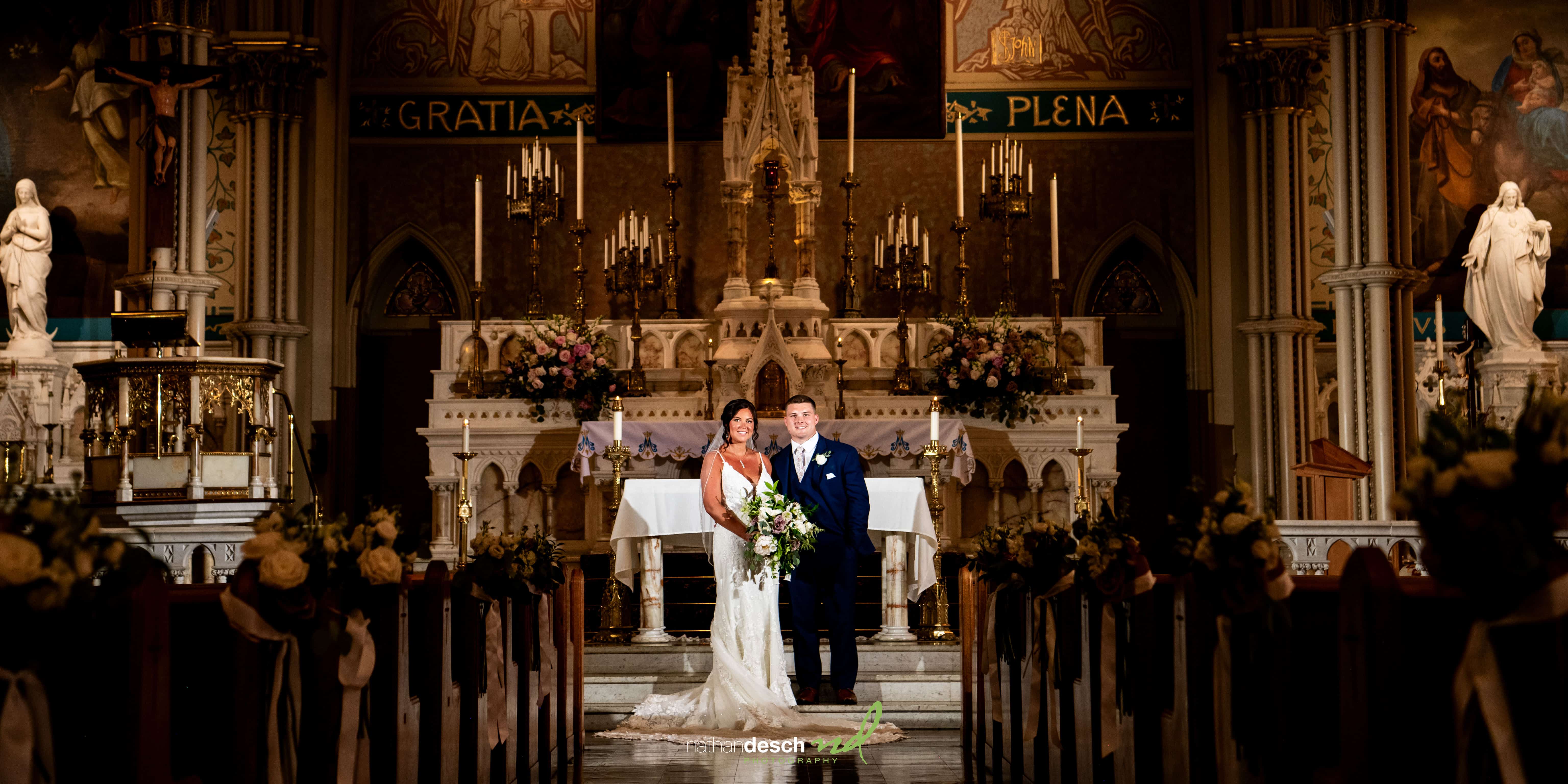 Portrait of bride and groom in Church in lancaster, PA after ceremony