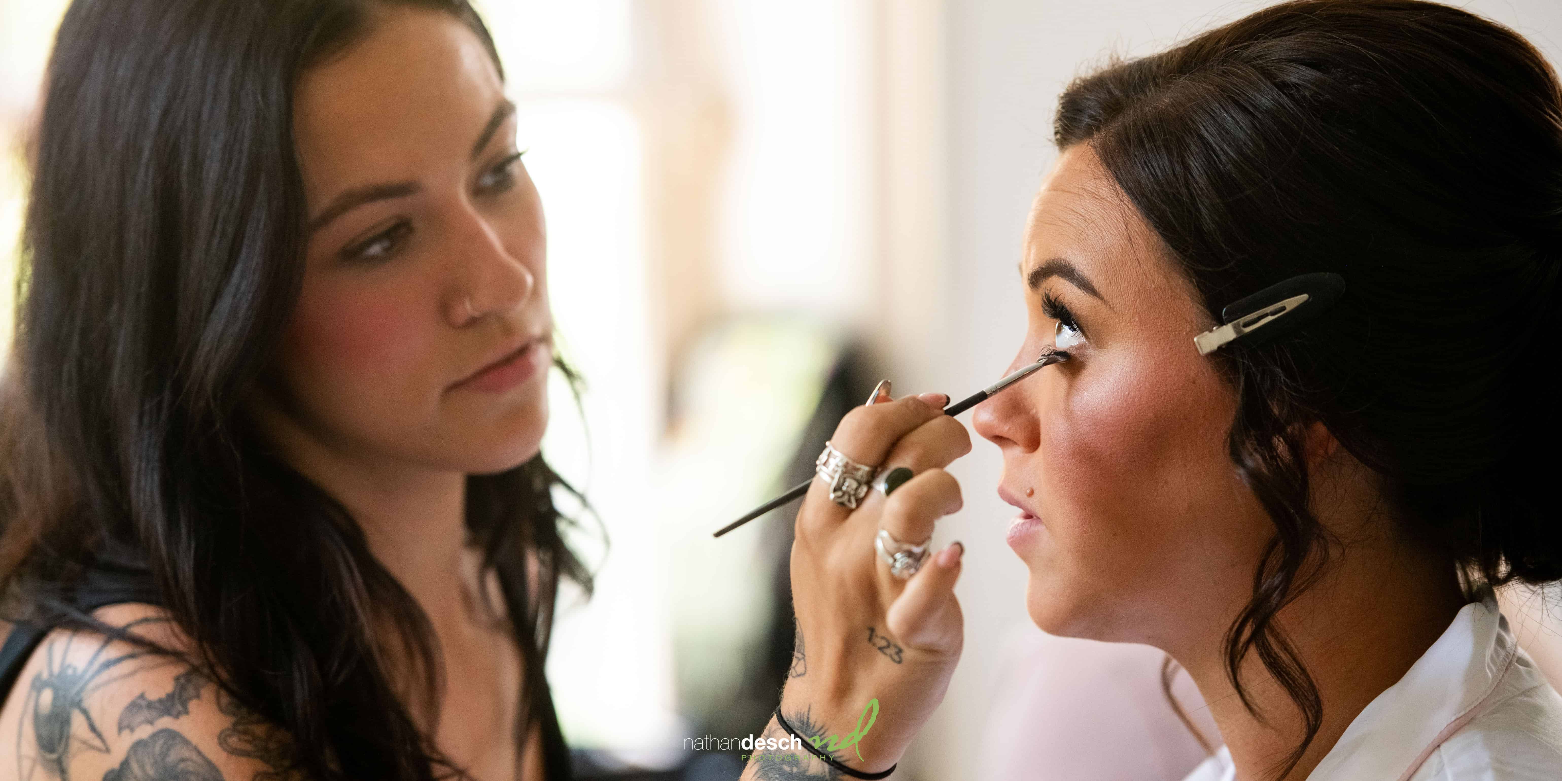 Bride getting makeup done