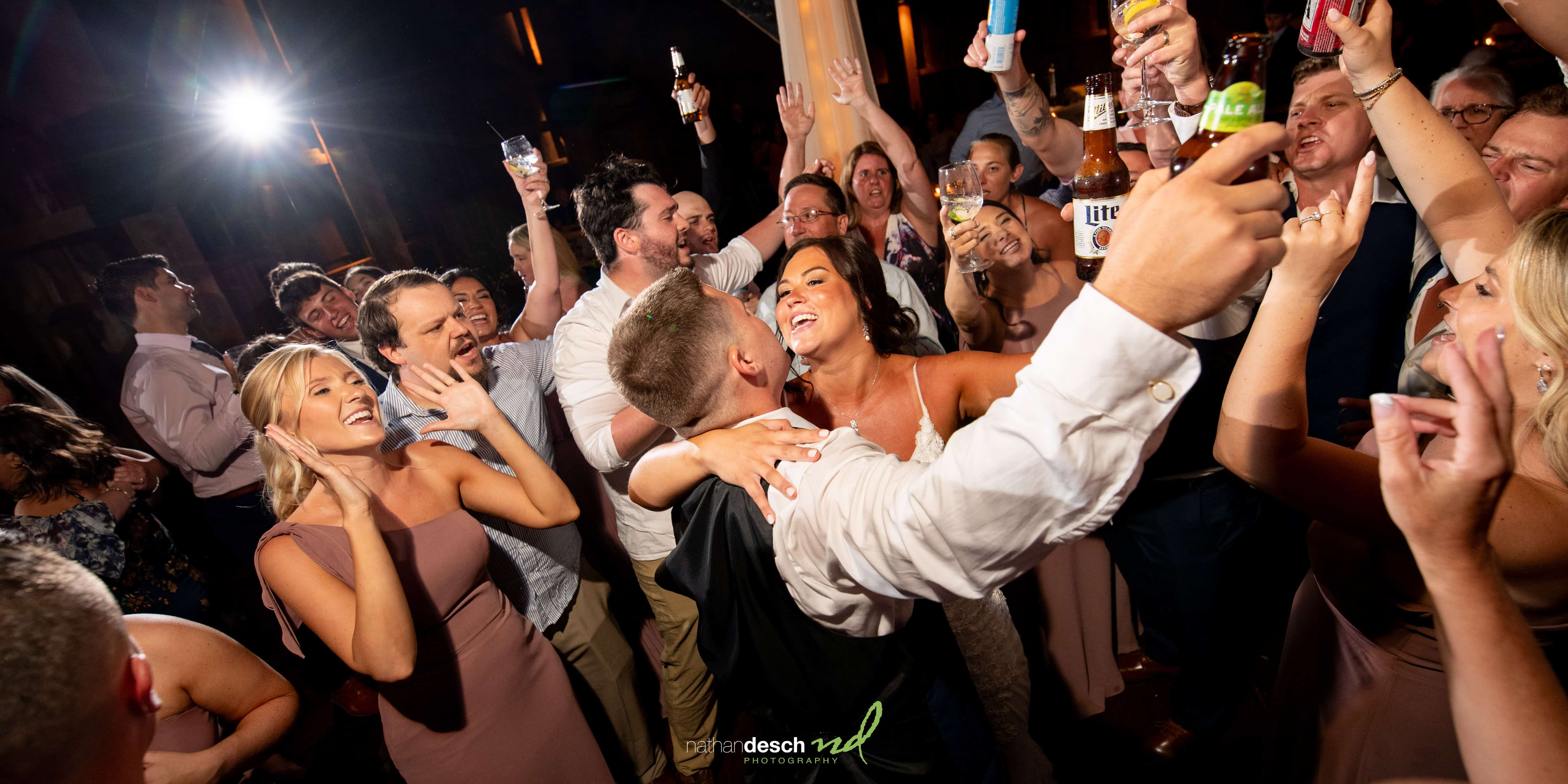 bride and groom enjoying last dance at wedding