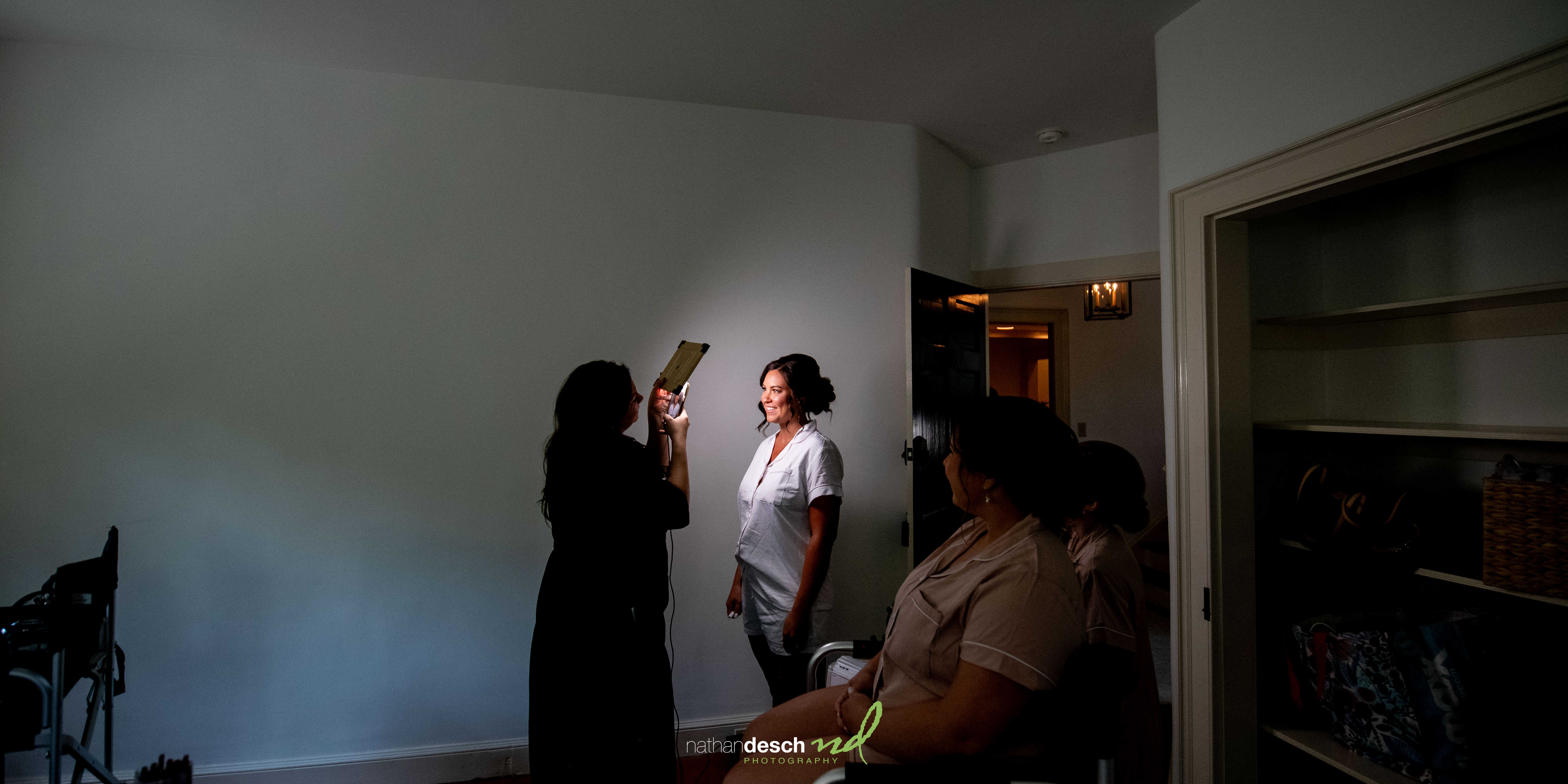 Bride getting makeup done