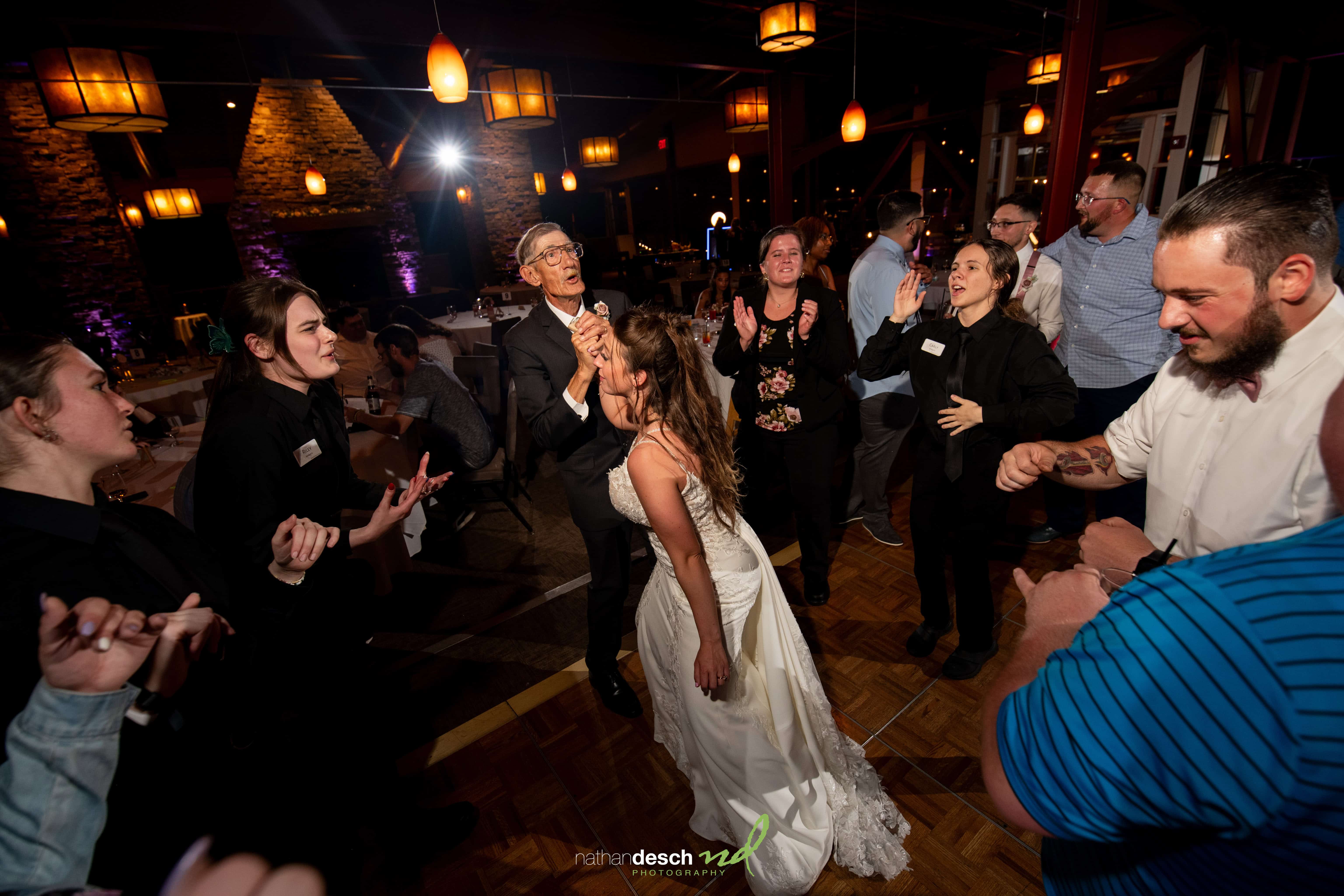 Bride and grandfather dancing